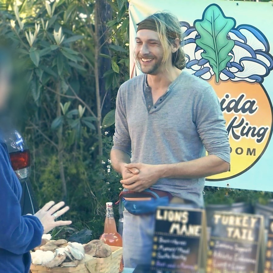 Andrew at the Florida Shroom King market table
